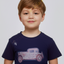 Child wearing a navy blue t-shirt with a vintage car design on a plain background