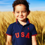 Child wearing a blue polo shirt with 'USA' on it, standing in a wheat field.