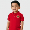 Child wearing a red polo shirt with a logo on a white background